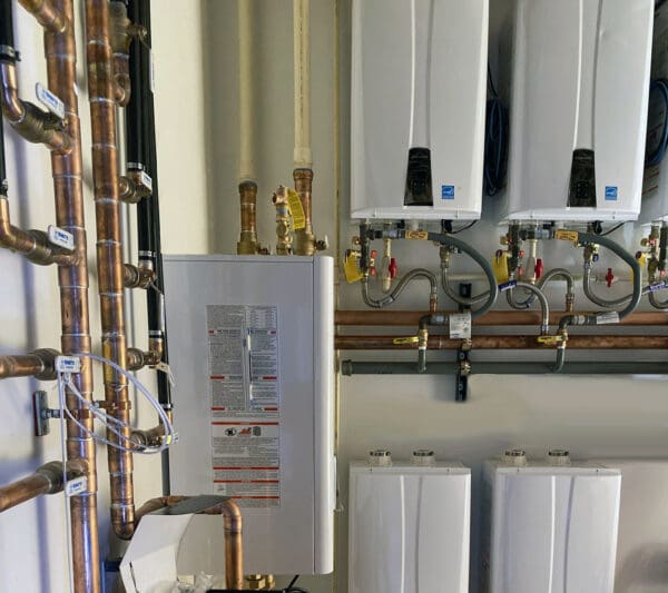 Commercial tankless water heaters and piping for efficient energy use. Expert installation by [Company Name].