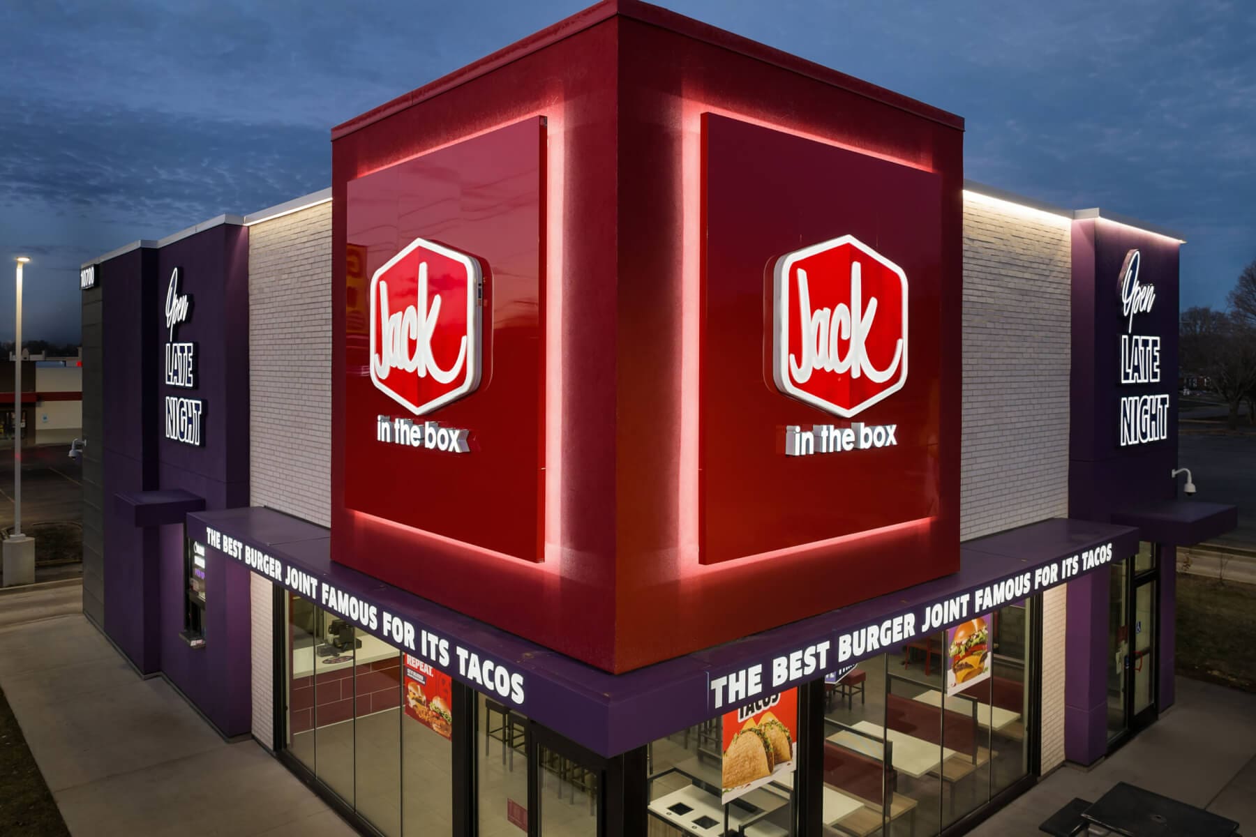 Jack in the Box restaurant exterior at night, highlighting their late-night dining option and famous tacos.