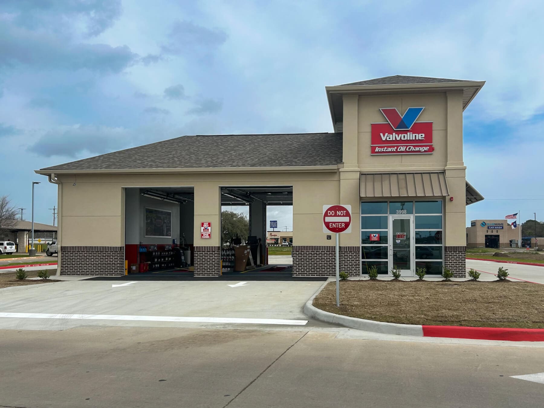Valvoline Instant Oil Change service center with open garage.