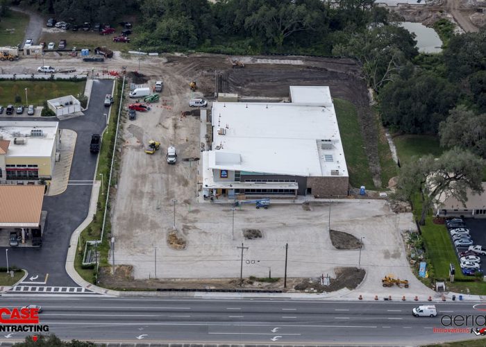 Aerial view of commercial construction site by Case Contracting, featuring a new Aldi store next to Wawa.