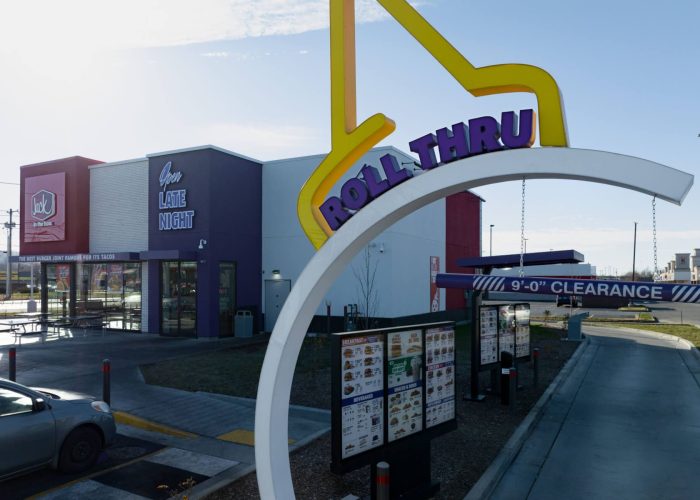 Drive-thru at Jack in the Box open late night for fast food convenience.