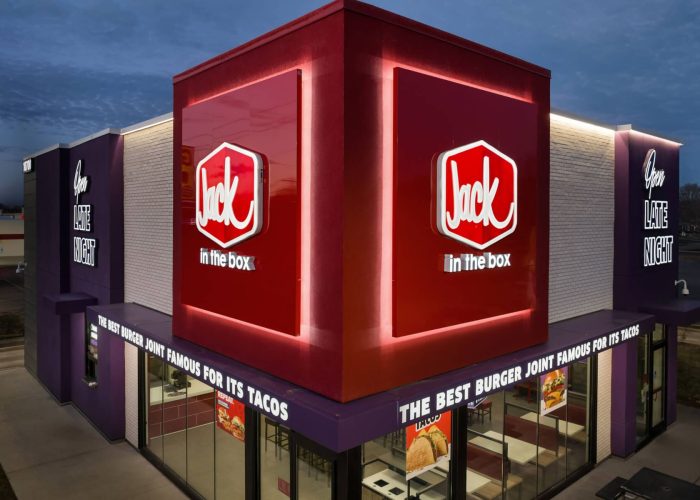 Jack in the Box restaurant exterior at night, highlighting their late-night dining option and famous tacos.