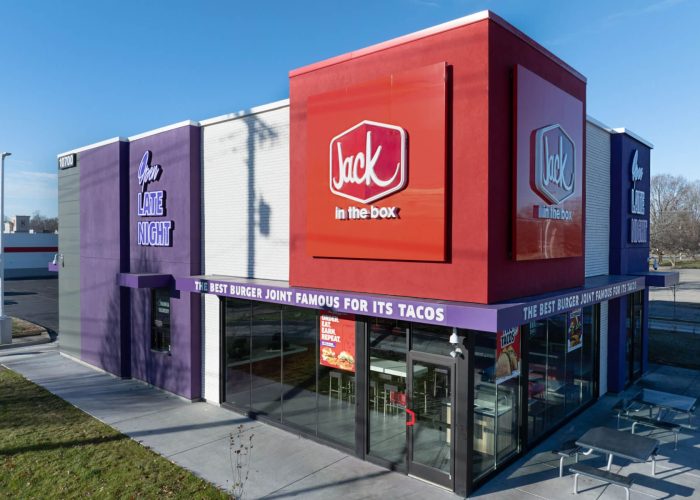 Exterior of a Jack in the Box restaurant, showcasing its colorful late-night-friendly design.
