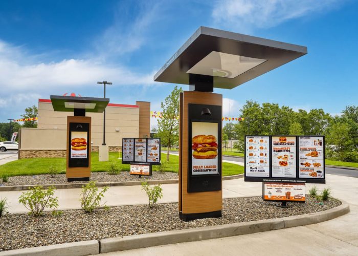 Drive-thru menu with Fully Loaded Croissan'wich at a fast-food restaurant, showcasing breakfast options and combos.