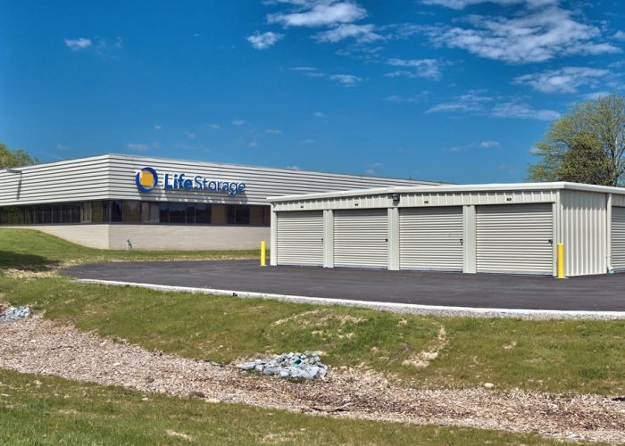 LifeStorage facility exterior with rental units in a landscaped area.