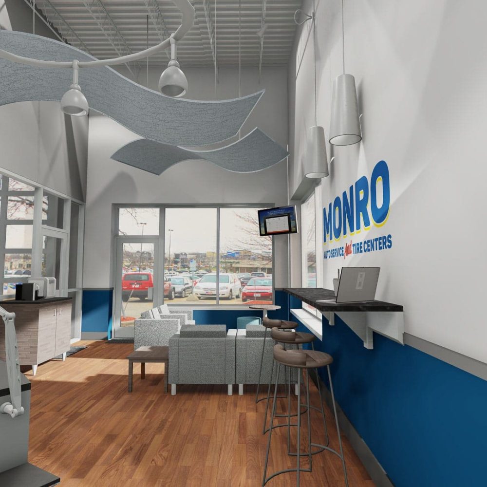 Monro Auto Service waiting area with reception desk and seating. Bright, welcoming space for customers.
